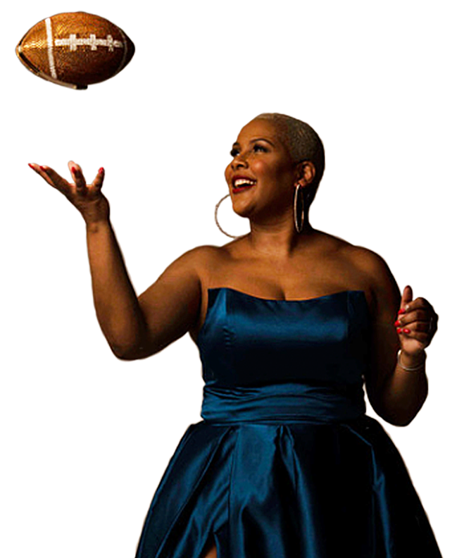 Reeta Hubbard tossing a football